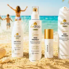 Strandtag mit Familie und bedrop Suncare Produkten. Sonnenschutz mit Sheabutter schützt die Haut.